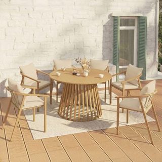 Salon de jardin SOLAL table ronde 120 cm avec pied lattes en métal et 6 chaises de jardin avec lanières et coussins beiges